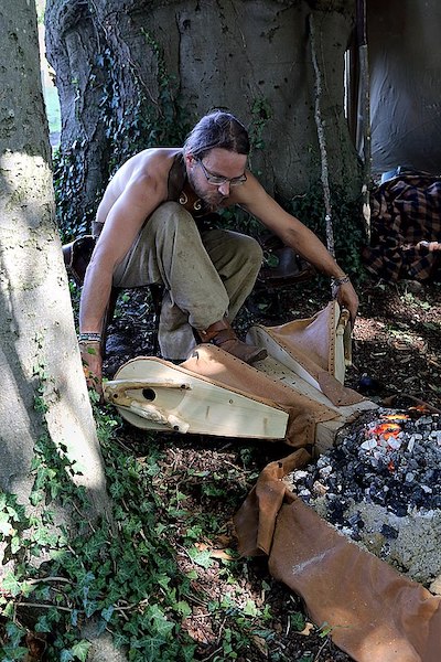 Medieval festival blacksmith with bellows